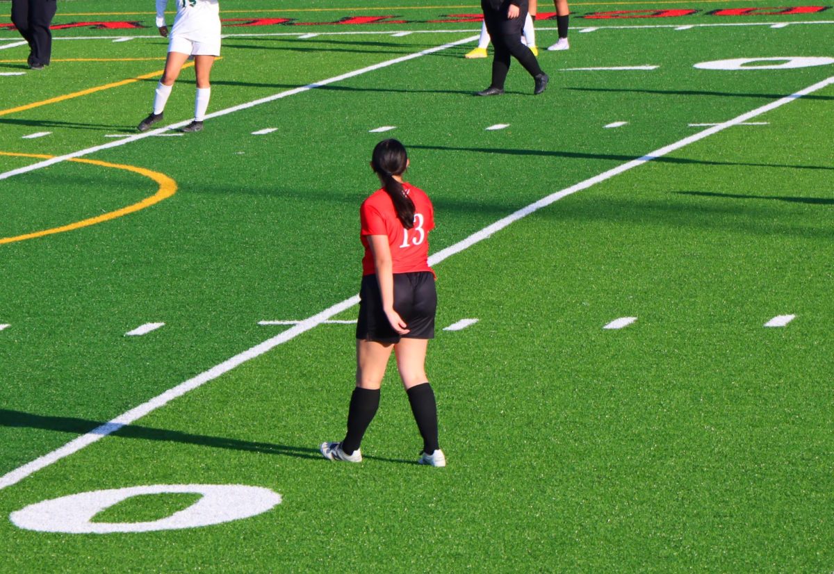 Sophomore Ayana Udstuen walks and looks for a good position to get open for a pass.
