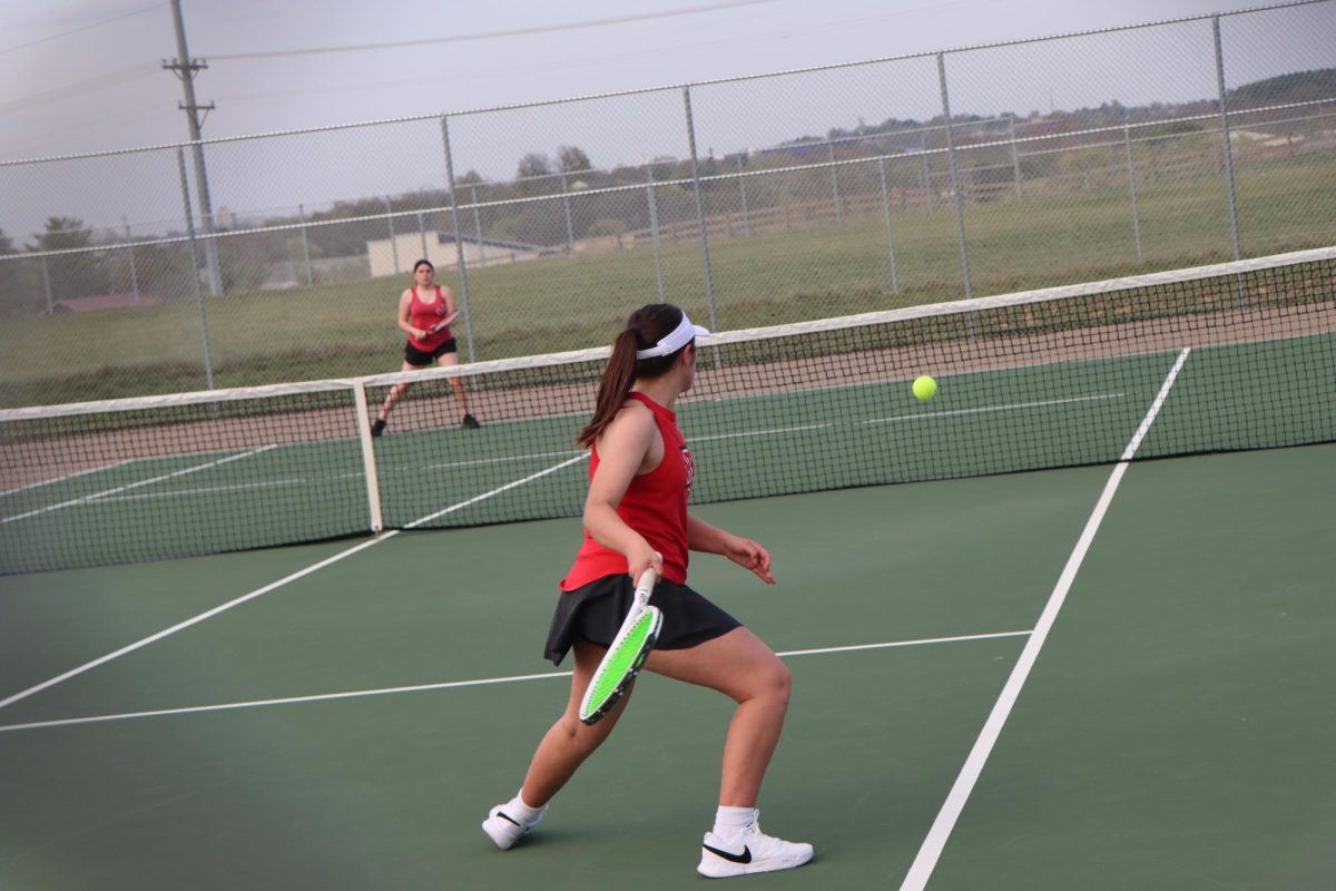 Eleanor Troxell sets up for a return as during her singles match.

