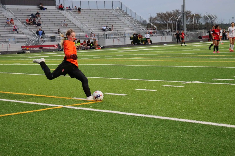 Senior Kiele Neil makes a goal kick.