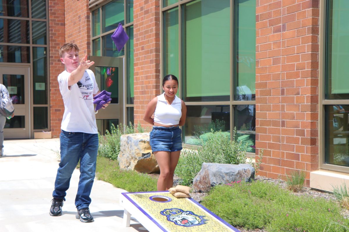 Senior Cayden Lucas aims for the whole on decision day. 