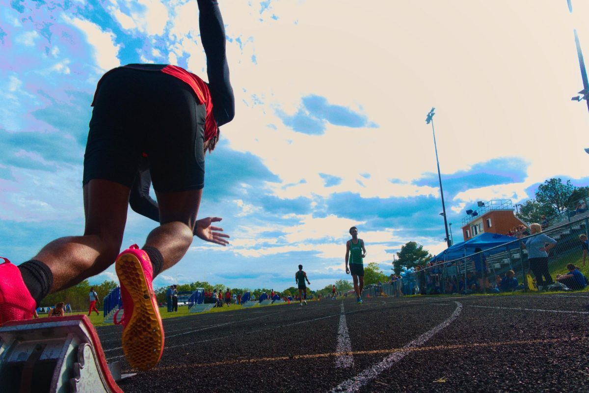 Jaleel De La Cruz coming out the block in the 100m dash at sportwood