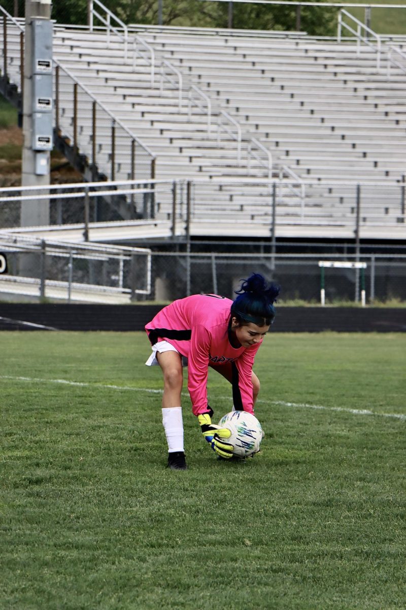 Kenia Arteaga Alvarado Saves ball during warm up.