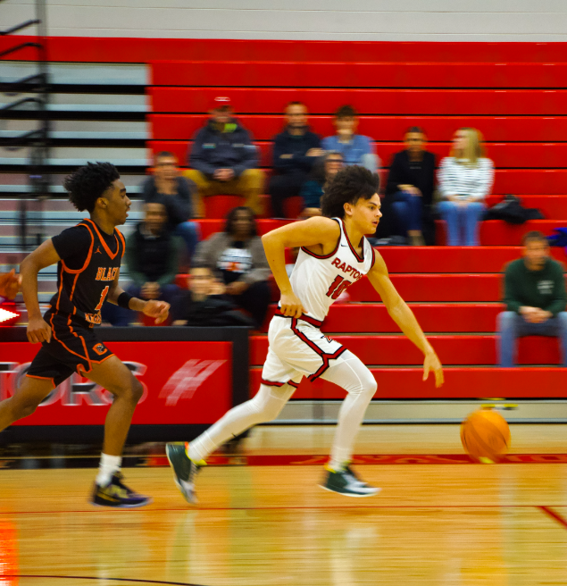 DJ Robbins on a fastbreak after stealing the ball from the opposing team